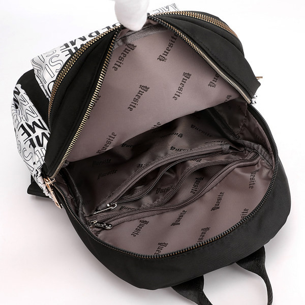 Sieviešu tekstila mugursoma ar ārējo kabatu