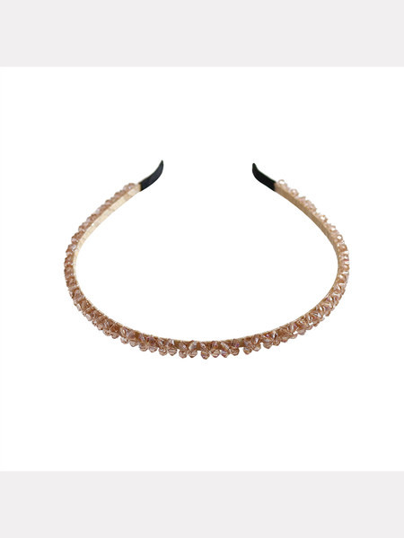 Sieviešu matu diadēma ar dekoratīviem akmeņiem