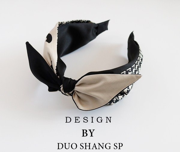 Sieviešu galvas lente ar platu malu un lenti