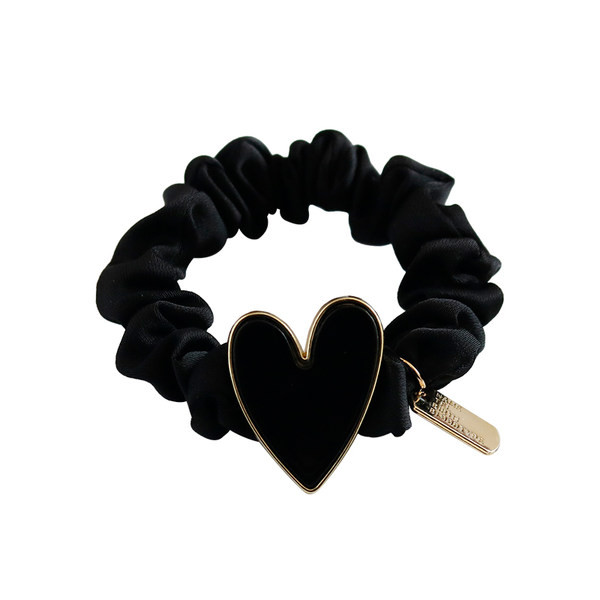 Dekoratiivse südamega naiste kummikud