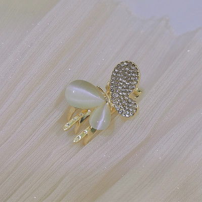 Златиста фиба за коса с камъни