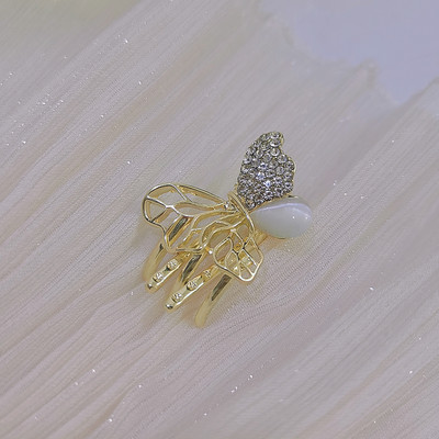 Златиста фиба за коса с камъни