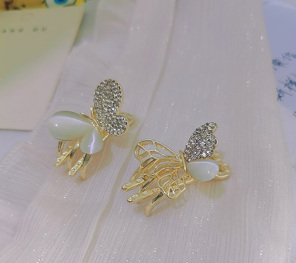 Златиста фиба за коса с камъни