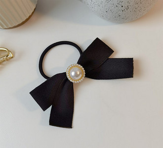 Дамски ластик с формата на панделка