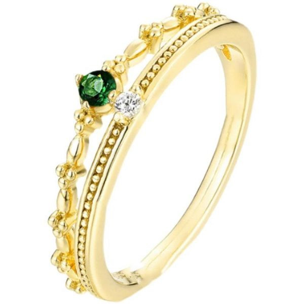 Hétköznapi női gyűrű kövekkel - arany színben