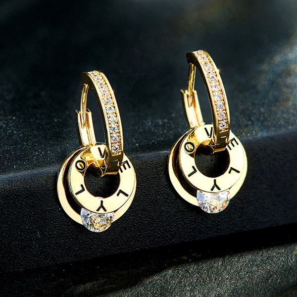 Cercei moderni de dama cu pietre decorative de culoare aurie