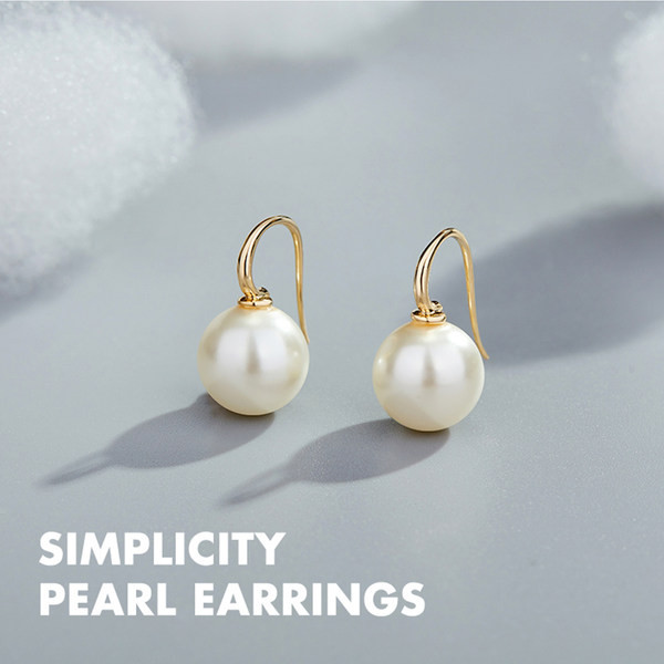 Moderne ženske naušnice sa biserom - zlatne boje