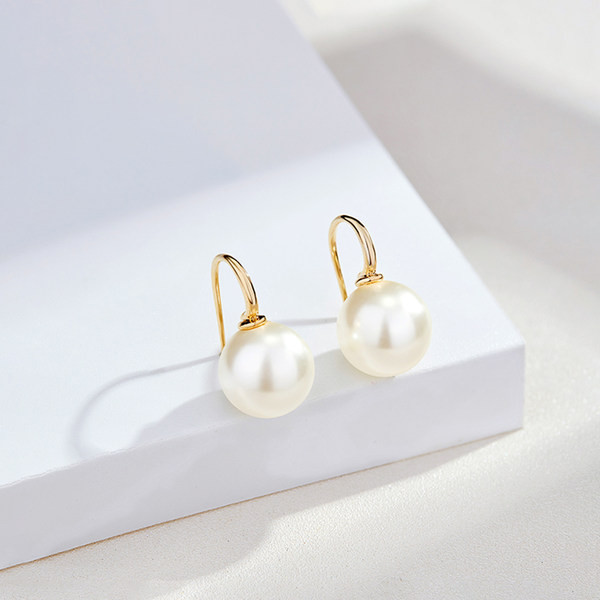 Moderne ženske naušnice sa biserom - zlatne boje