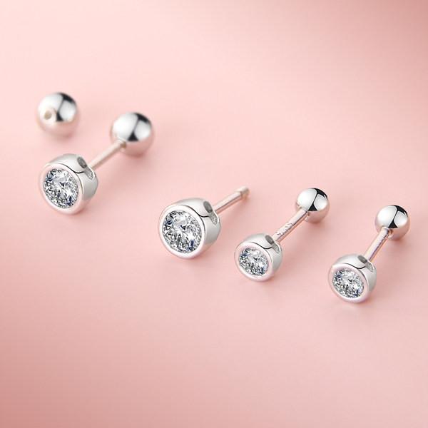 Model nou de cercei de dama in forma rotunda si pietre decorative