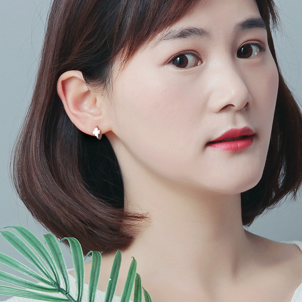 Cercei de damă din argint în formă de trifoi cu patru foi