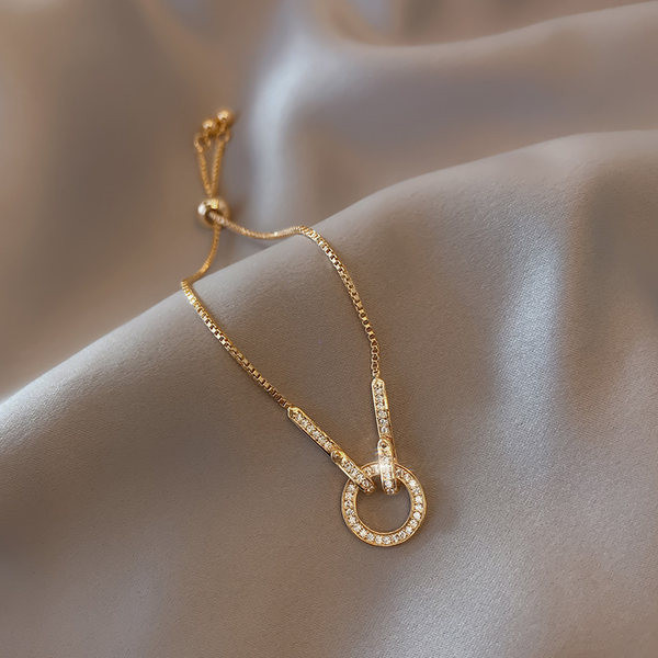 Bratara de dama moderna cu pietre decorative - culoare aurie si argintie