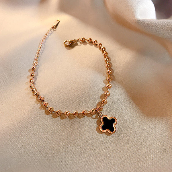 Bratara de dama din diverse elemente metalice