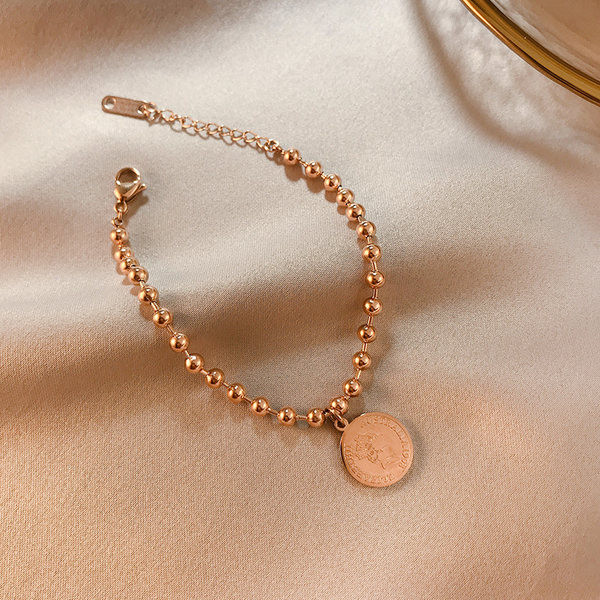 Bratara de dama din diverse elemente metalice