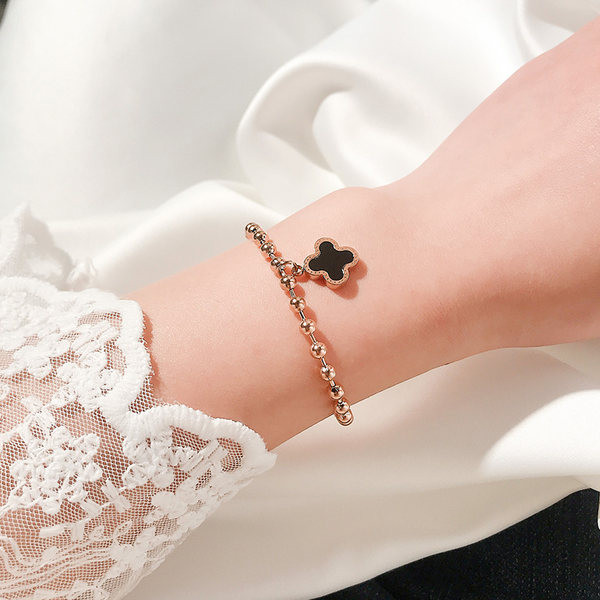 Bratara de dama din diverse elemente metalice