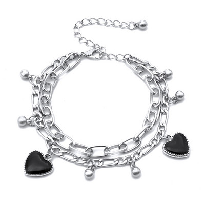 Women`s bracelet with metal pendants