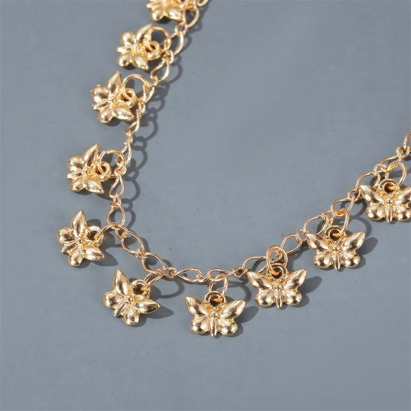 Bratara de dama reglabila cu pandantive de culoare aurie