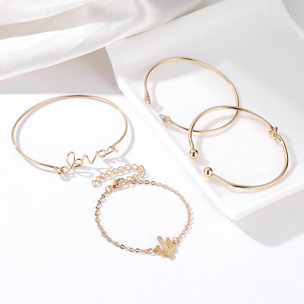 Bratara moderna de dama din 4 piese de culoare aurie