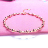 Ležerna ženska narukvica u zlatnoj boji