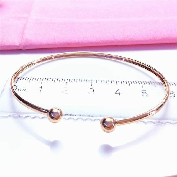 Ženska otvorena narukvica s perlama