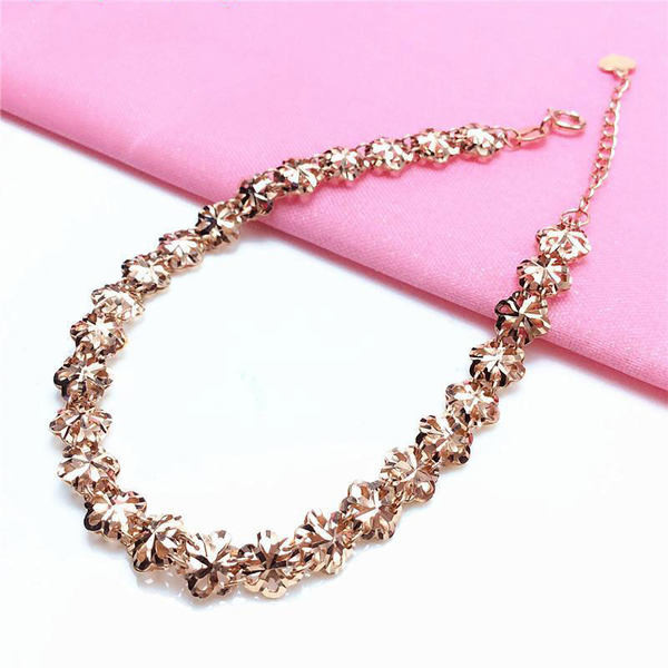 Μοντέρνο βραχιόλι λουλουδιών και μενταγιόν καρδιά