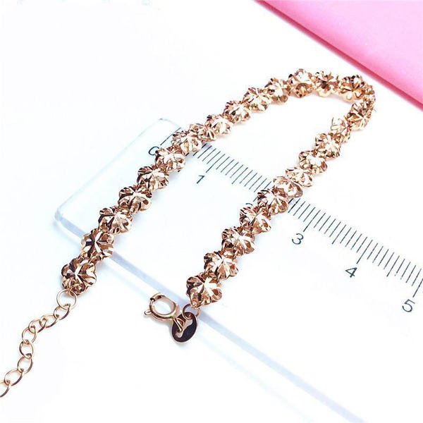 Μοντέρνο βραχιόλι λουλουδιών και μενταγιόν καρδιά