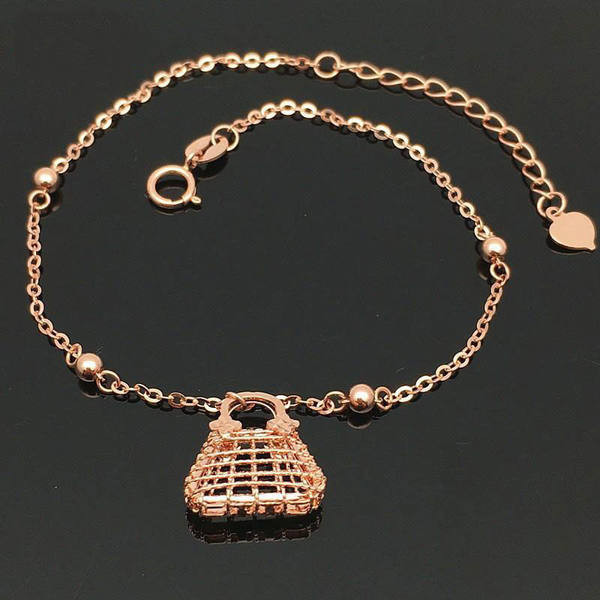 Κομψό γυναικείο βραχιόλι με μενταγιόν