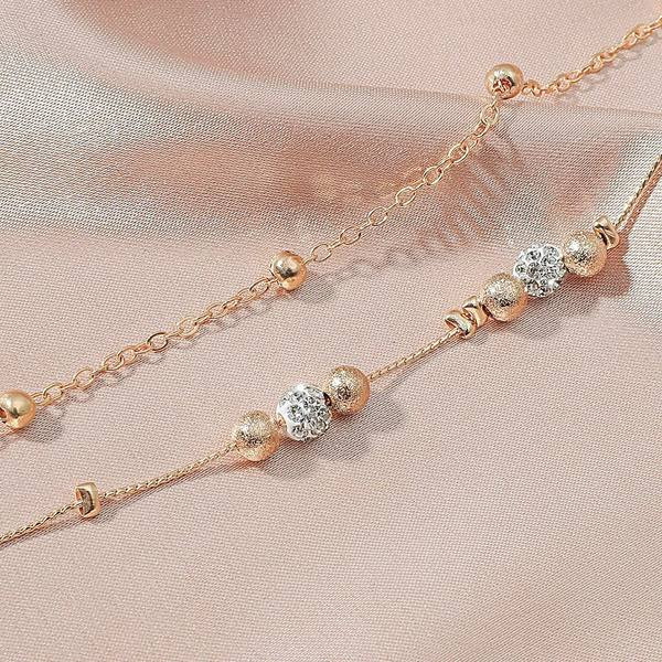 Ежедневна дамска гривна в златист цвят с мъниста