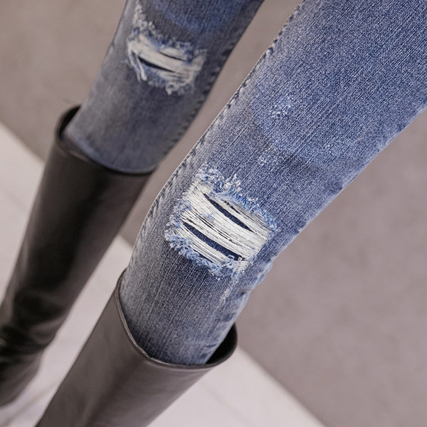 Naiste kõrge vöökohaga rebitud motiiviga fliisteksad