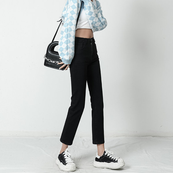 Puhas muster teeb naiste kõrge vöökohaga teksapüksid