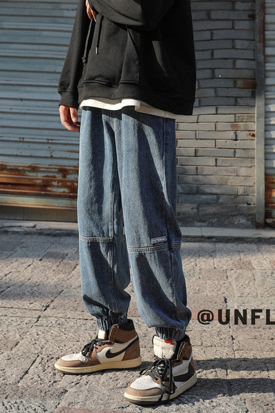 Ležerne muške traperice s džepom - široki model