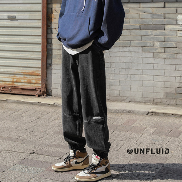 Ležerne muške traperice s džepom - široki model