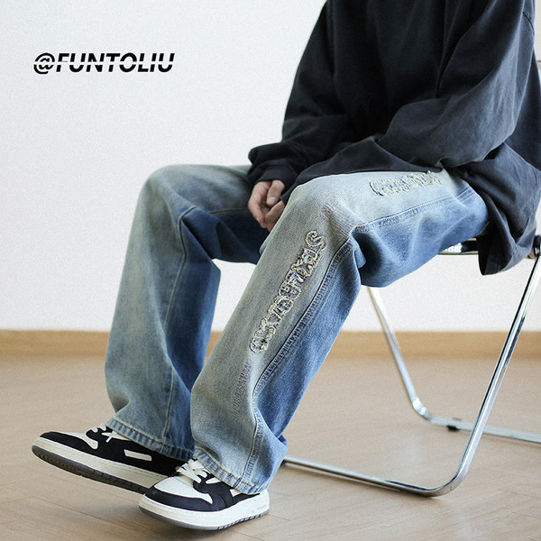 Muške traperice s poderanim motivima