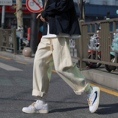 Blugi cu picioare late pentru bărbați