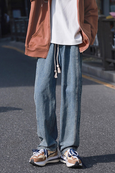 Blugi cu picioare late pentru bărbați