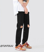 Muške crne poderane traperice s uzorkom