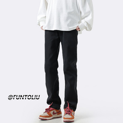 Muške crne poderane traperice s uzorkom