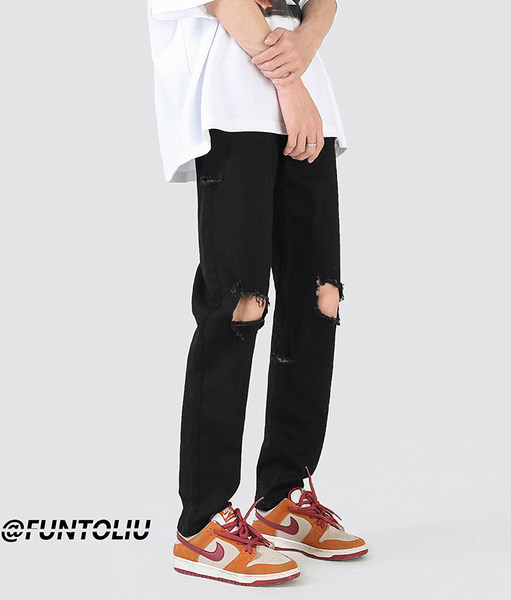 Muške crne poderane traperice s uzorkom