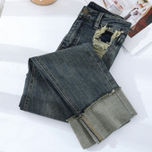 Ležerne ženske traperice s podstavom od flisa i poderanim elementima