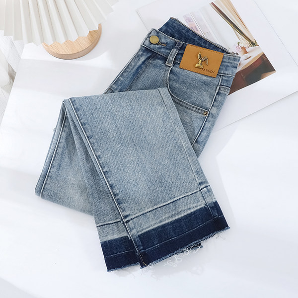 Ženske traperice jesen-zima s logom - ravni model