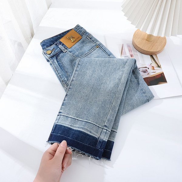 Ženske traperice jesen-zima s logom - ravni model