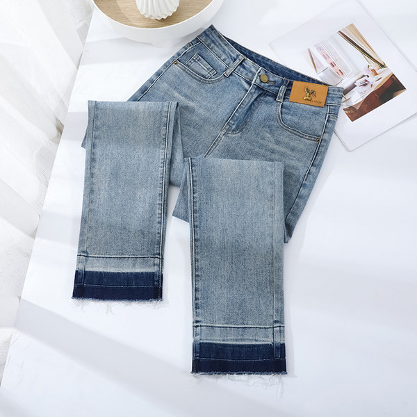 Ženske traperice jesen-zima s logom - ravni model