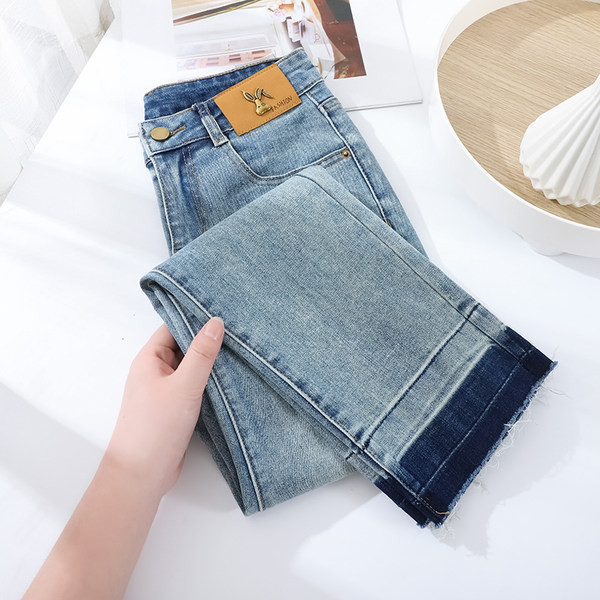 Ženske traperice jesen-zima s logom - ravni model