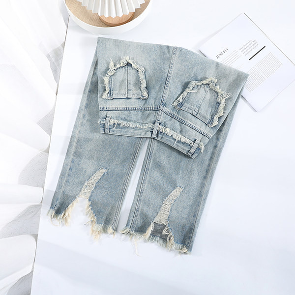 Ženske široke traperice s poderanim motivima i visokim strukom