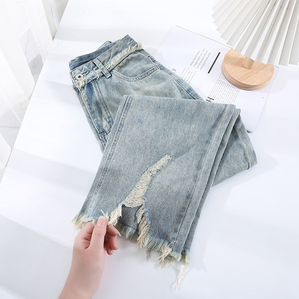 Ženske široke traperice s poderanim motivima i visokim strukom