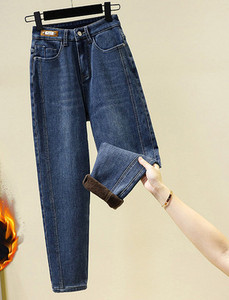 Guangzhou Xintang naiste teksad ja sametist paksud püksid 2022. aasta talvetalvised naiste redis Haroni püksid