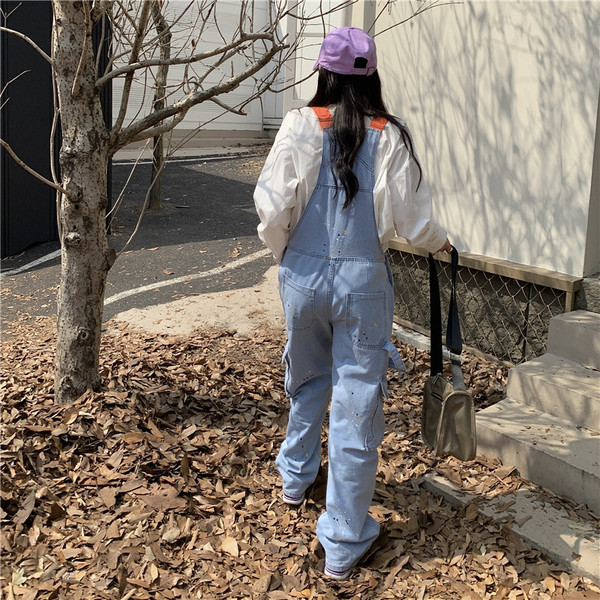 Tasuta mustriga naiste logoga kombinesoon