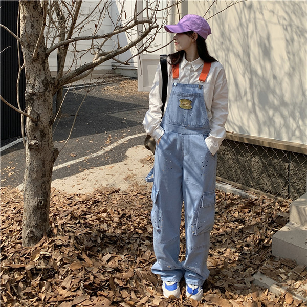 Tasuta mustriga naiste logoga kombinesoon