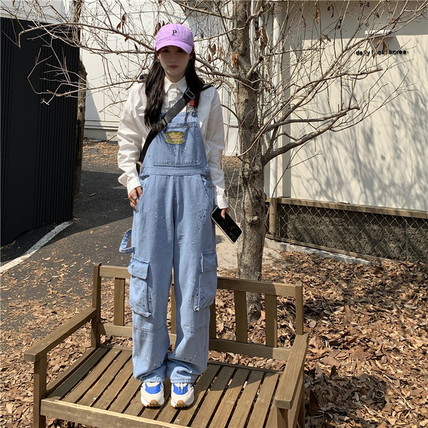 Tasuta mustriga naiste logoga kombinesoon