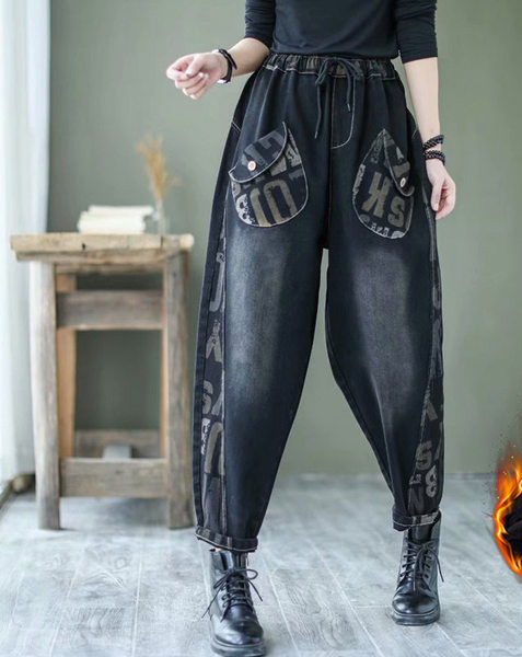 Naiste fliisist teksapüksid lai paelte, tasku ja trükiga mudel