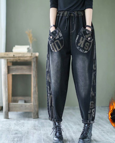 Naiste fliisist teksapüksid lai paelte, tasku ja trükiga mudel